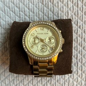 MICHAEL Kors gold ladies watch.